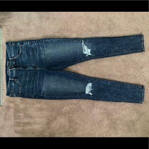 Dark acid wash destroyed jeans